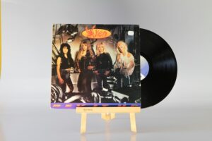 VIXEN - REV IT UP